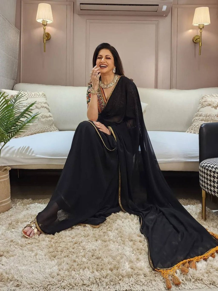 DESIGNER WEAR BLACK MAGIC FAUX GEORGETTE SAREE WITH HEAVY SEQUANCE EMBROIDERED WORK BLOUSE.