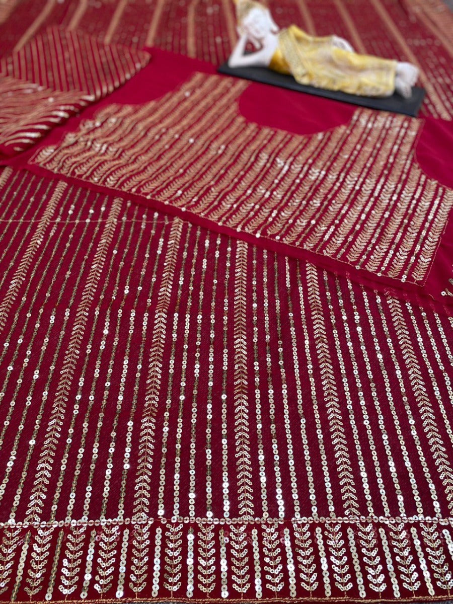 BEUTIQUE WEAR COLLECTION DOUBLE SEQUANCE WORK SAREE ON GEORGETTE WITH HEAVY WORK BLOUSE.