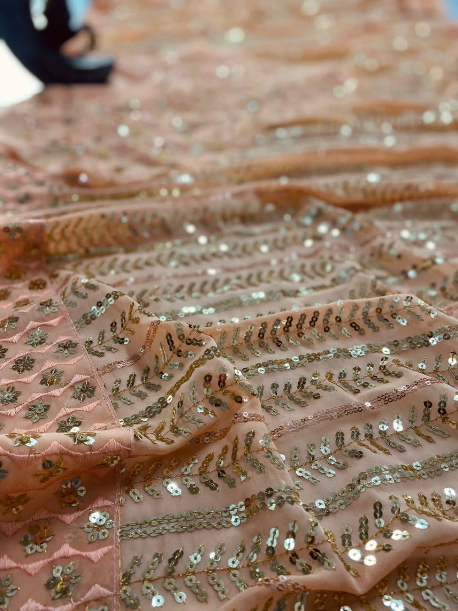 WEDDING WEAR GOOD OUTFIT DOUBLE SEQUANCE WORK SAREE ON GEORGETTE WITH HEAVY WORK.