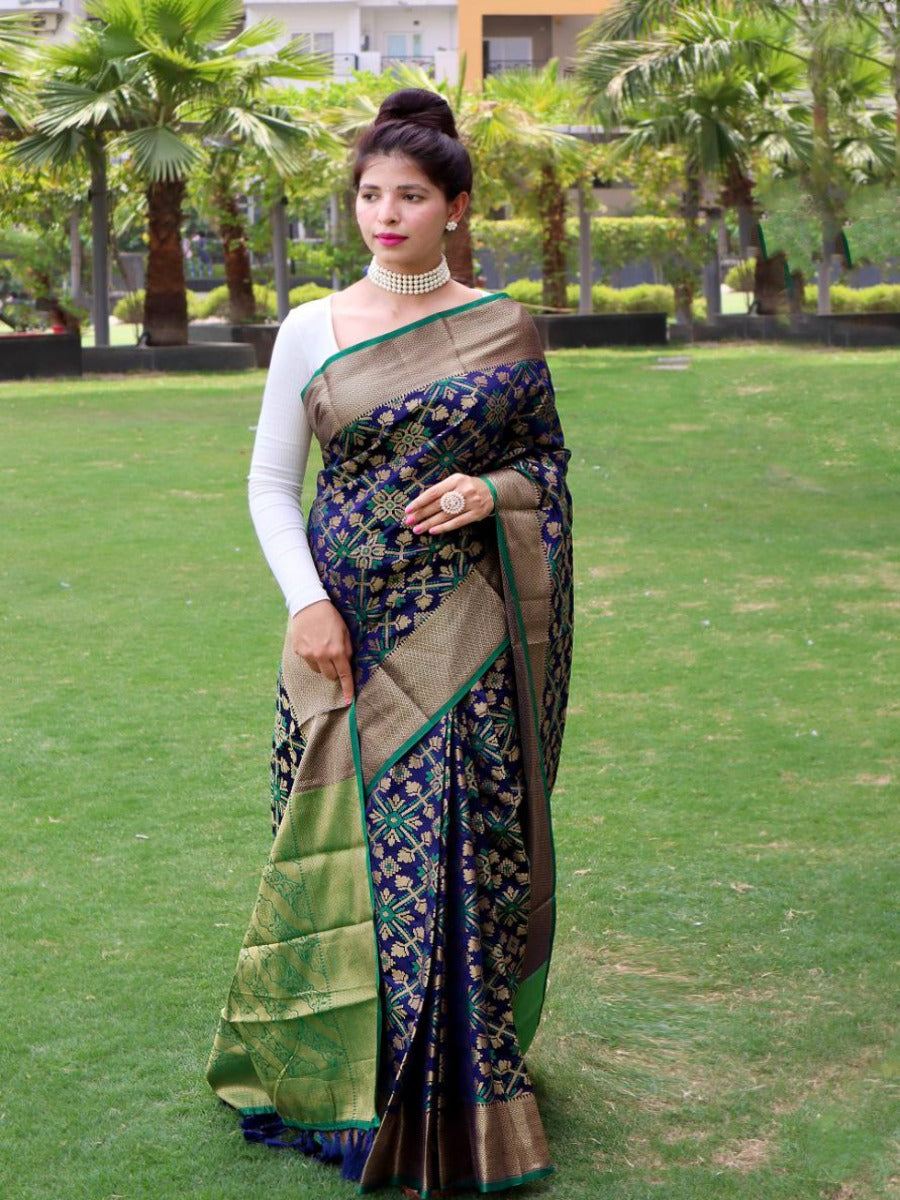 PRESENTING PURE PATOLA SILK SAREE WITH ALL OVER WEAVED DESIGN.
