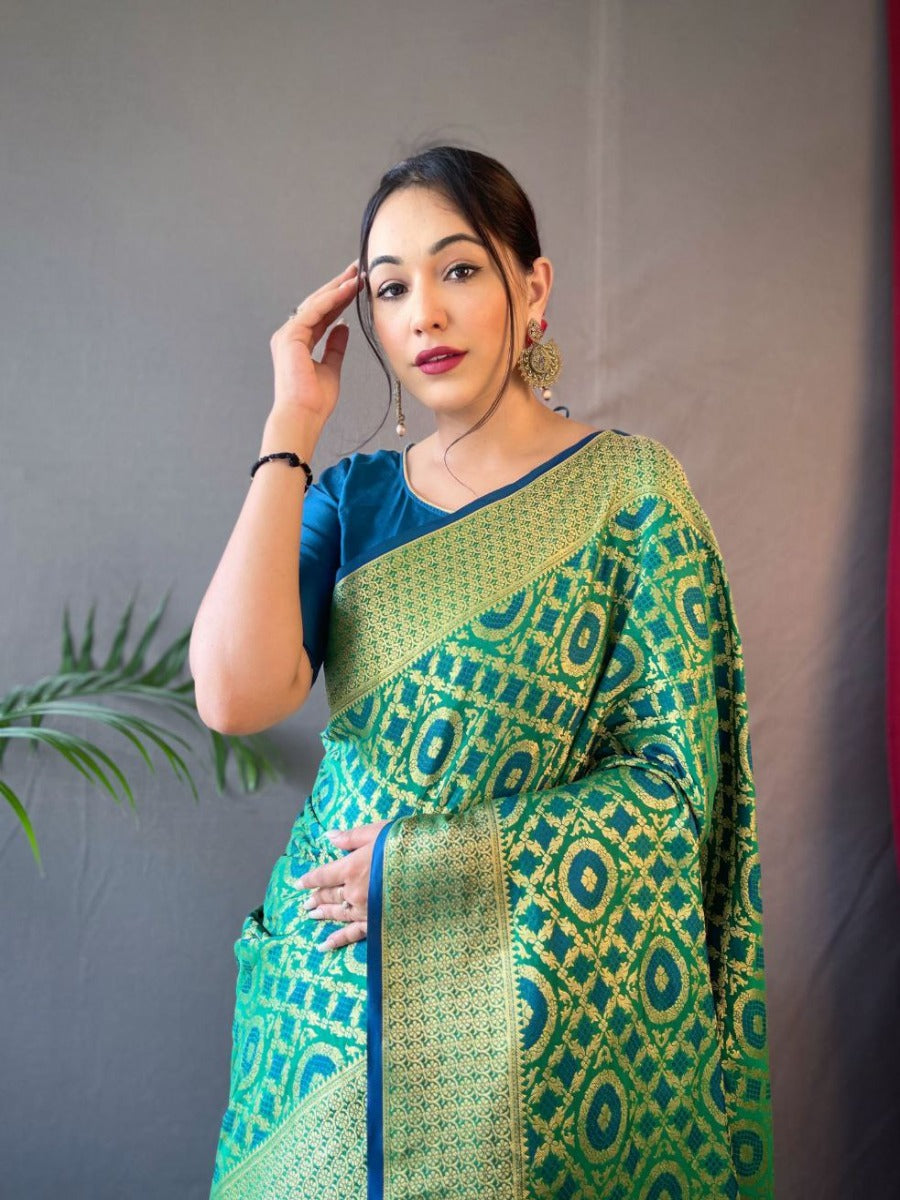 PURE PATOLA SILK SAREE WITH ALL OVER WEAVED DESIGN.