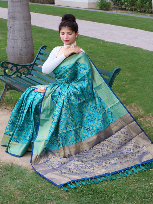 PRESENTING PURE PATOLA SILK SAREE WITH ALL OVER WEAVED DESIGN.