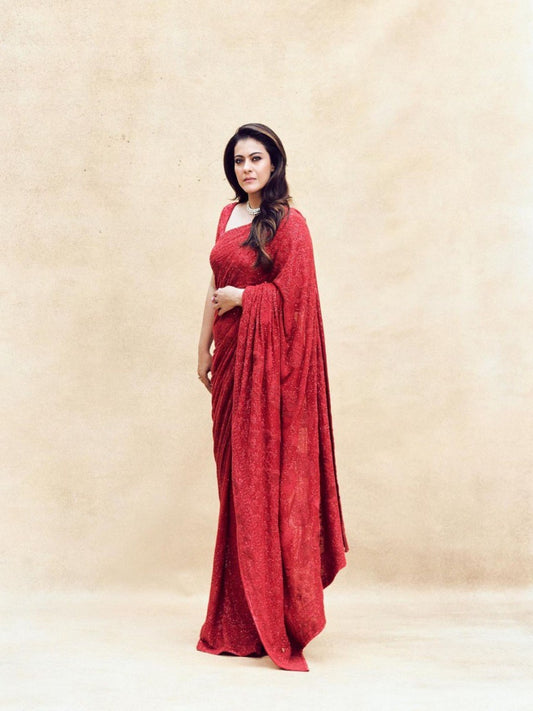 STARKING THE PARTY WEAR A STUNNING RED FAUX GEORGETTE HEAVY SEQUANCE EMBROIDERED SAREE WITH BLOUSE.