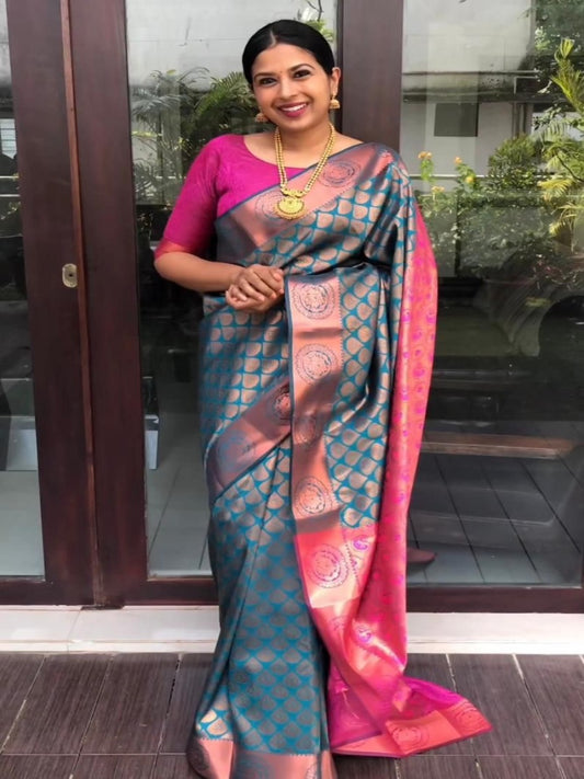 Presenting Lichi Silk Banarasi Saree With Copper Weaving.