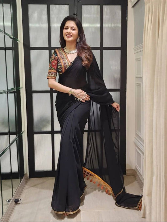 DESIGNER WEAR BLACK MAGIC FAUX GEORGETTE SAREE WITH HEAVY SEQUANCE EMBROIDERED WORK BLOUSE.