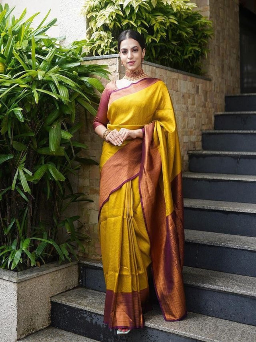 PRESERNTING LICHI SILK BANARASI SAREE IN GOLD WITH WINE SUPER RICH BELT WEAVING.