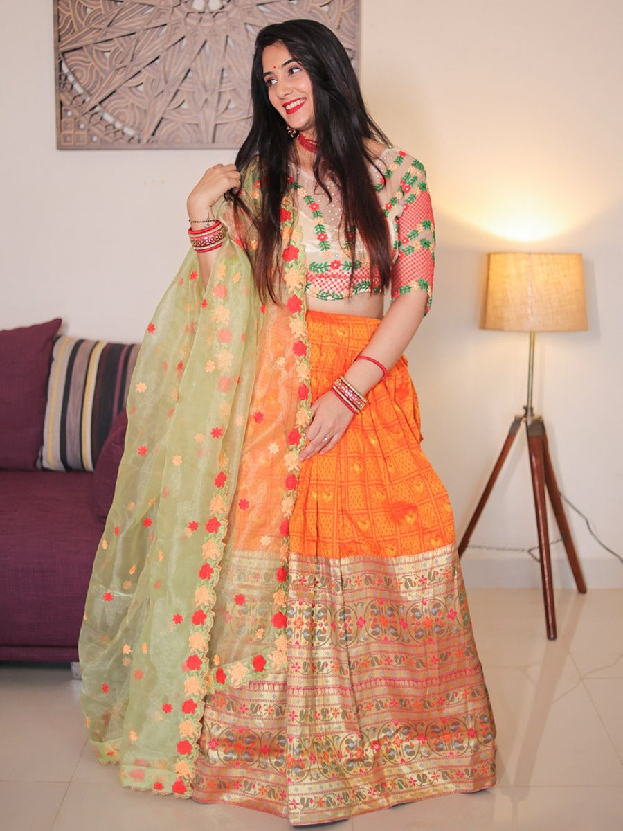 New Designer Wedding Orange Lehenga With Thread Embroidery Work And Handwork Blouse With a Beautiful Organza Dupatta.