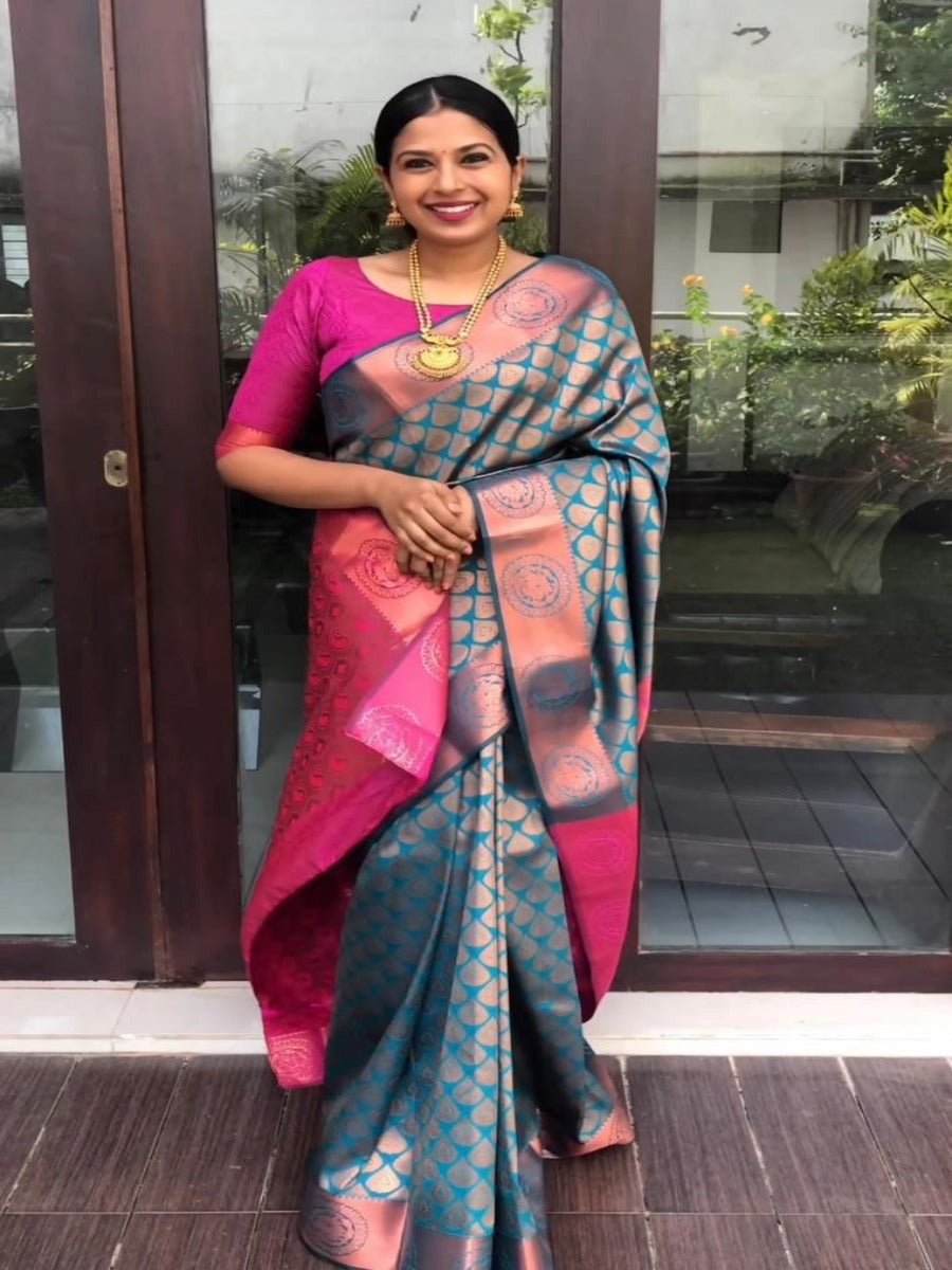 Presenting Lichi Silk Banarasi Saree With Copper Weaving.