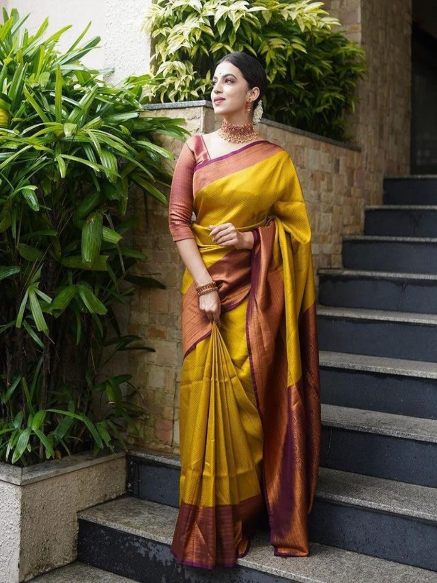 PRESERNTING LICHI SILK BANARASI SAREE IN GOLD WITH WINE SUPER RICH BELT WEAVING.