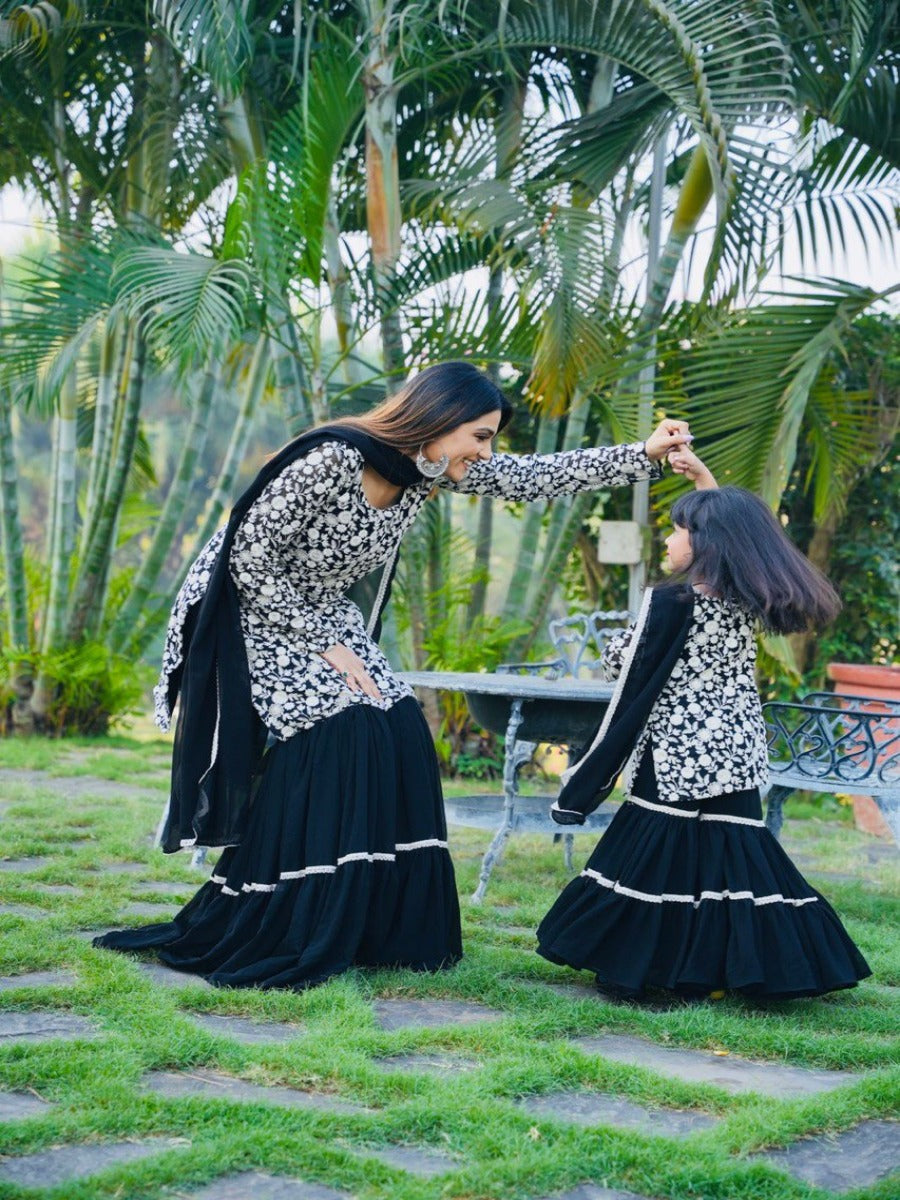 Trending Cording Black Mother & Daughter Gorgette With Embroidery Siquence Work Combo.