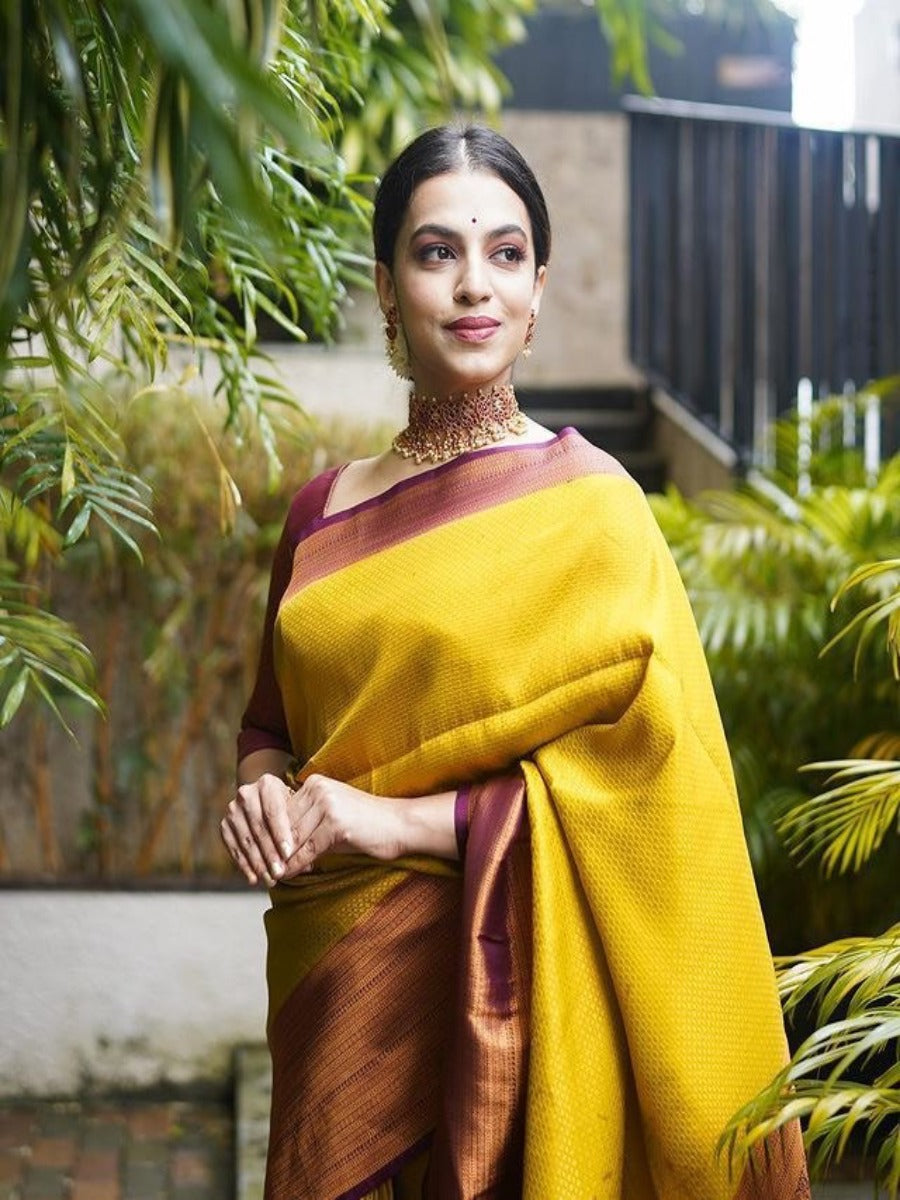 PRESERNTING LICHI SILK BANARASI SAREE IN GOLD WITH WINE SUPER RICH BELT WEAVING.