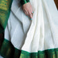 Pooja Special Lichi Silk Banarasi Saree With Green Kanjiwaram Figure.