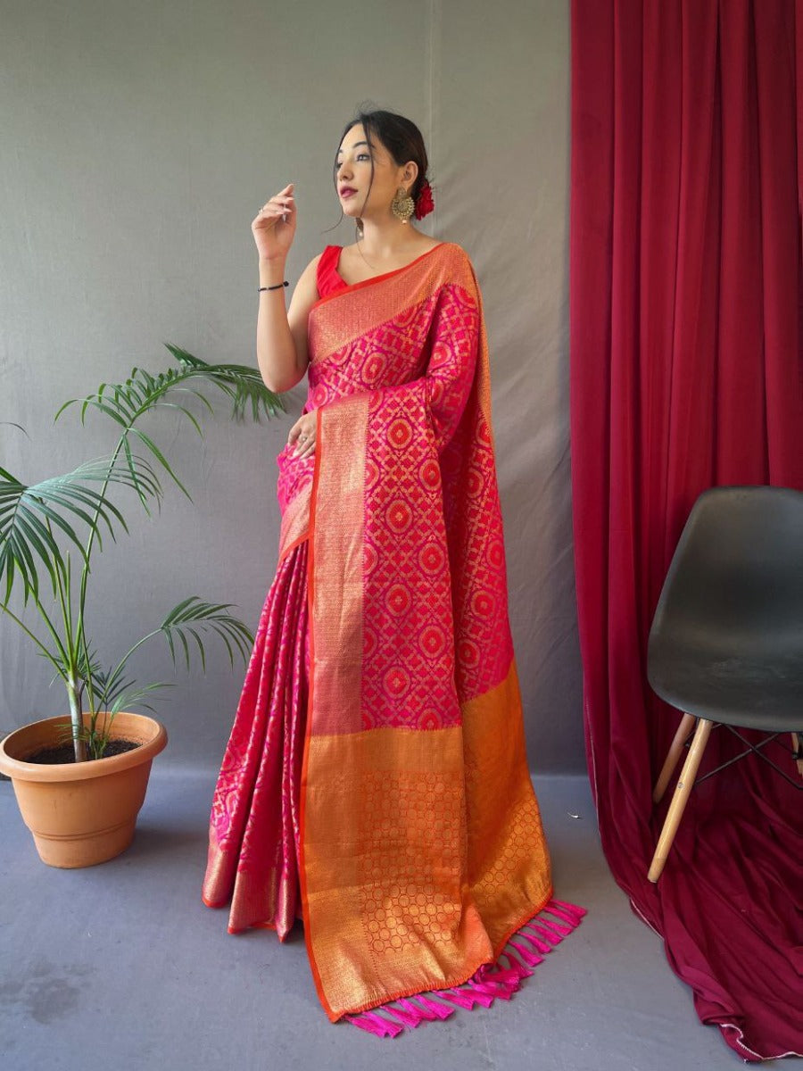 PURE PATOLA SILK SAREE WITH ALL OVER WEAVED DESIGN.